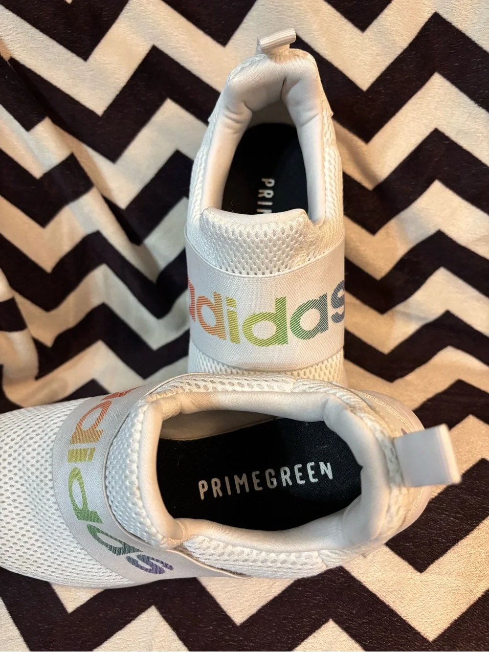 adidas Women's White Slip-On Sneakers with Rainbow Logo